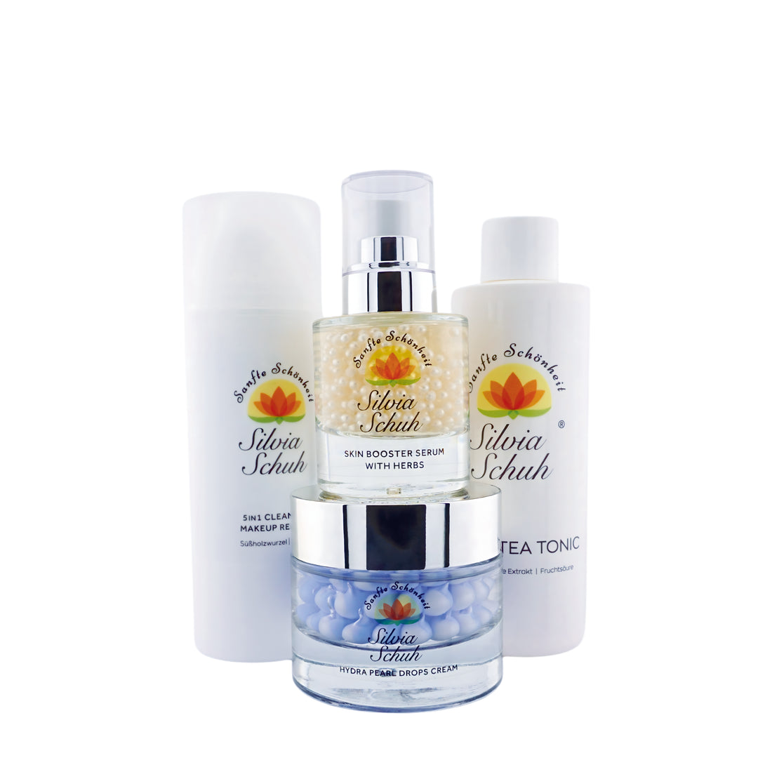 5-in-1-Reinigung, White Tea Tonic, Serum und Gesichtscreme in Kunststoffflaschen und Glastiegeln
